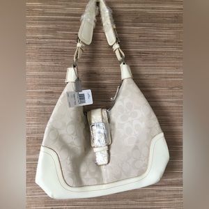 NWT Creme Coach purse. Beautiful bag for Spring!  Signature canvas and leather.
